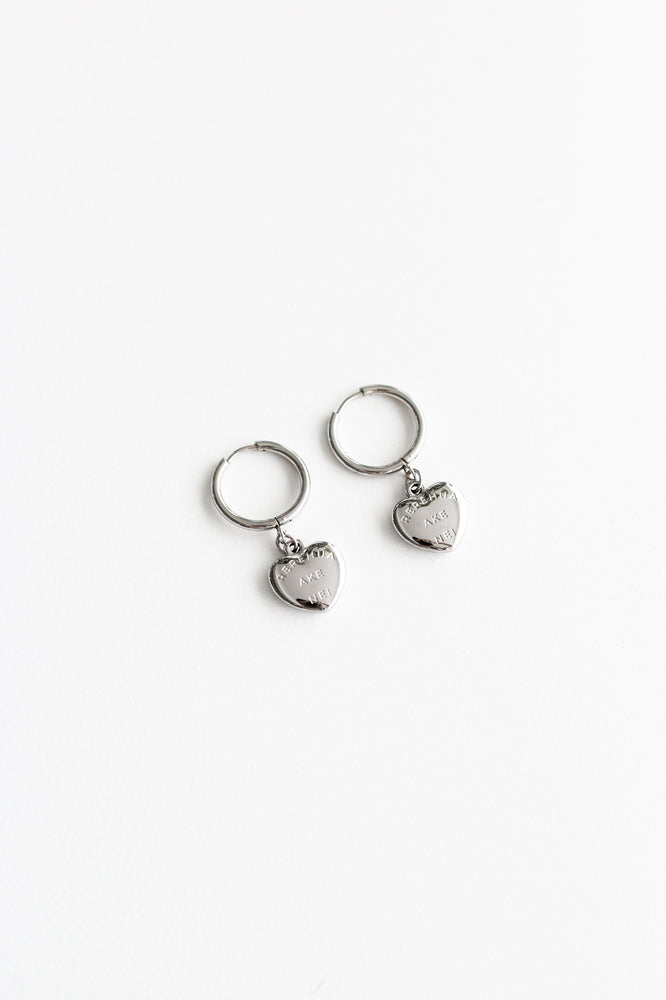 Rerehua ake nei - Heart Pendant Earrings in Silver