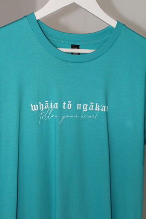 
            
                Load image into Gallery viewer, Whāia tō Ngākau, Follow Your Heart T-Shirt - Turquoise
            
        