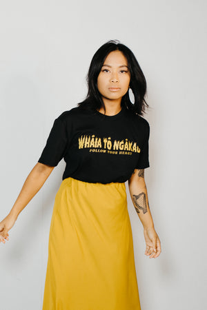
            
                Load image into Gallery viewer, Whāia tō Ngākau, Flame Font T-Shirt - Black with Mustard Print
            
        