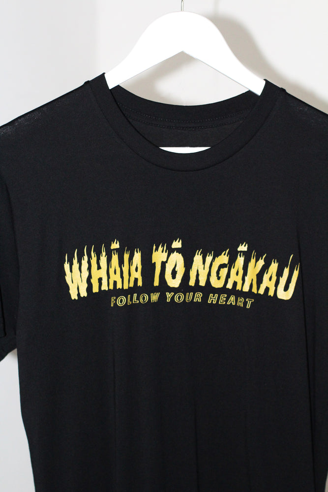 
            
                Load image into Gallery viewer, Whāia tō Ngākau, Flame Font T-Shirt - Black with Mustard Print
            
        